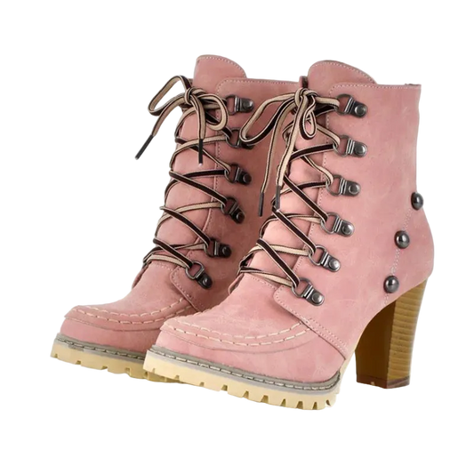 Pink lace-up boots with brown laces and buttons on a white background