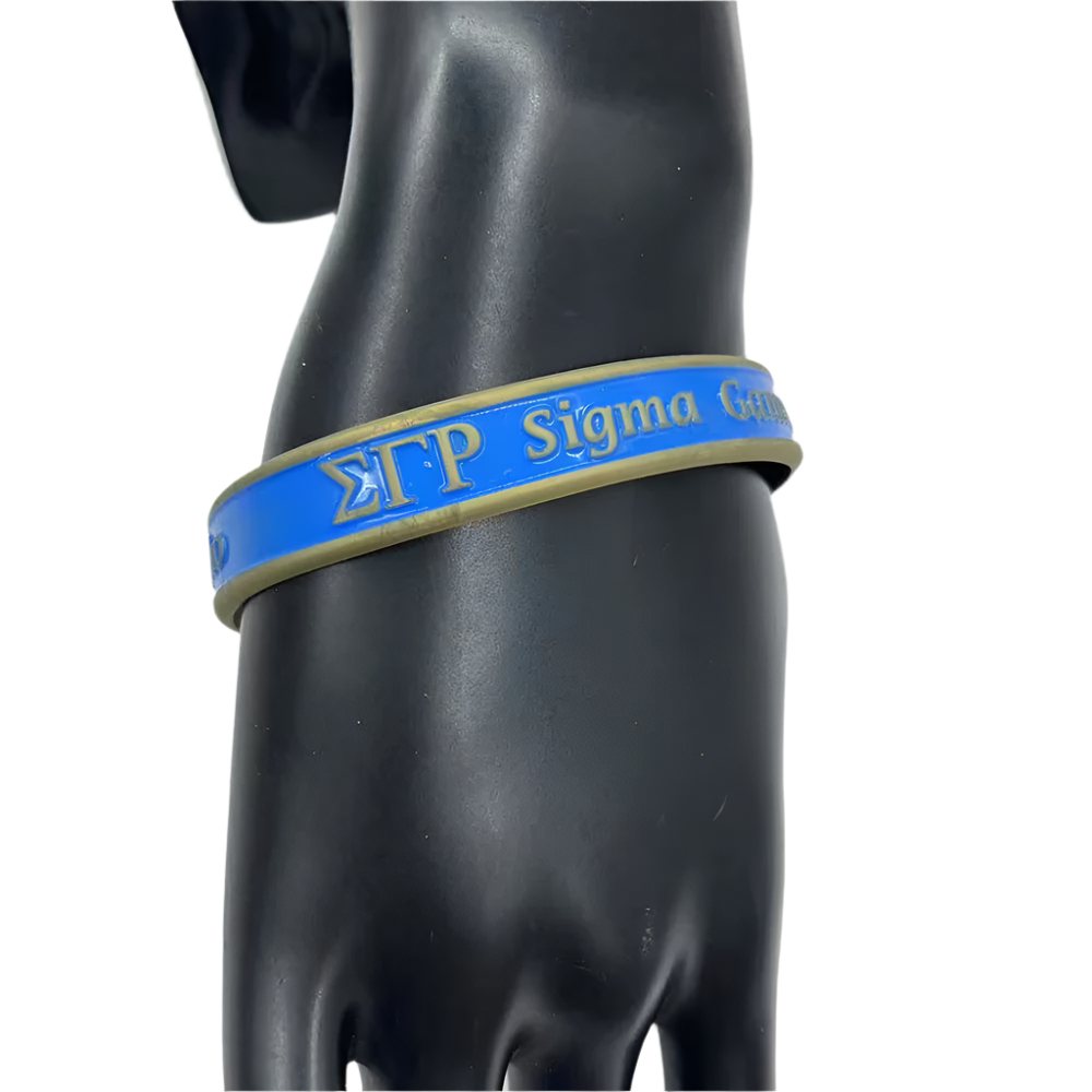 Blue and beige wristband with 'Sigma Gamma Rho' text on a black mannequin arm.