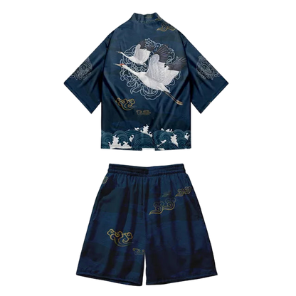 Navy blue traditional outfit with white and gold embroidery on a white background