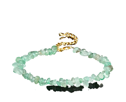 Green aventurine beaded bracelet on a black background with 'Natural Green Aventurine' text.