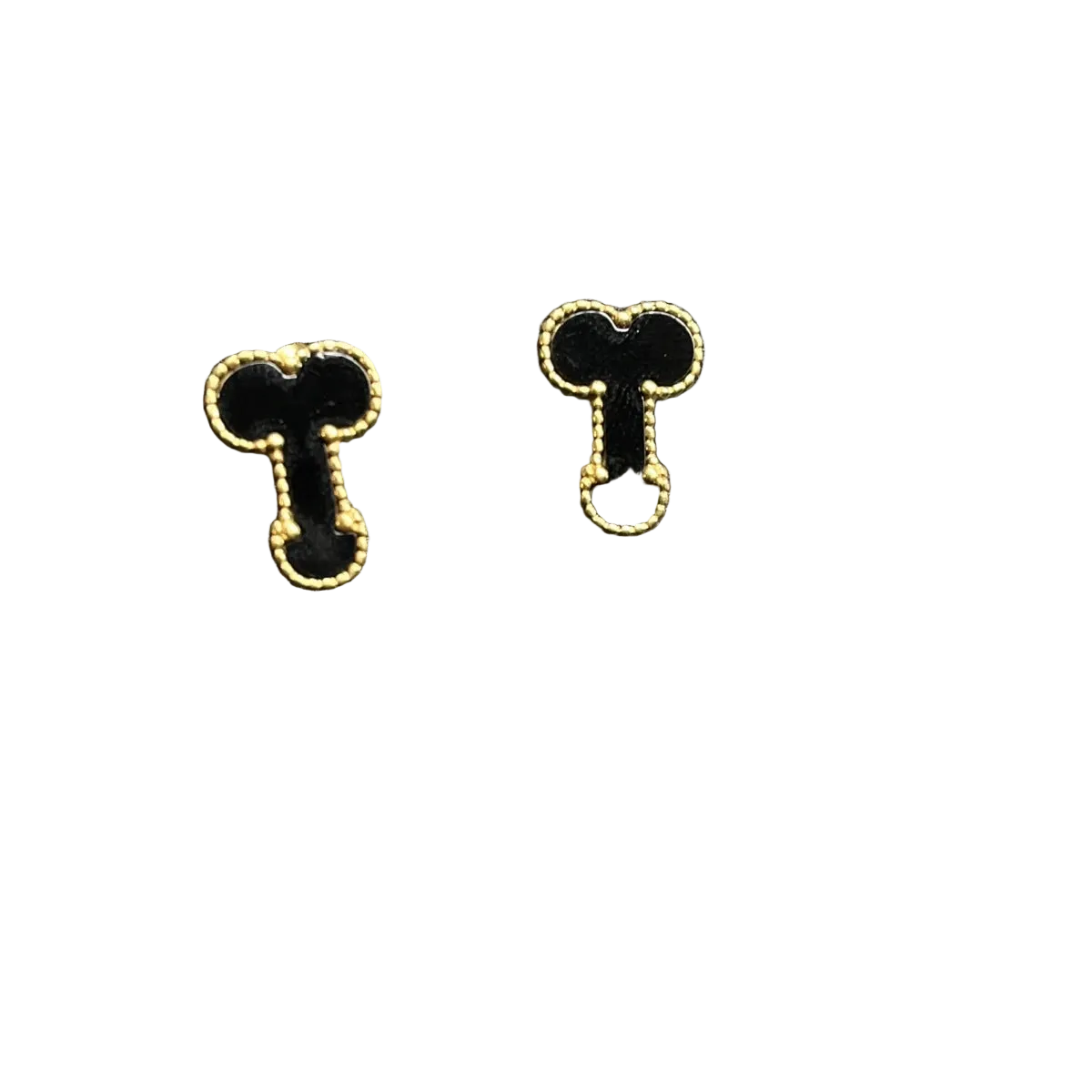 A pair of gold-tone stud earrings shaped like stylized keys, displayed on a textured black surface.
