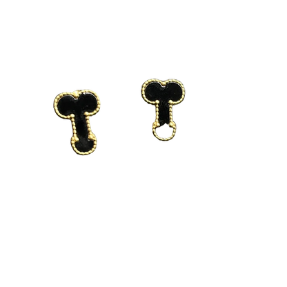 A pair of gold-tone stud earrings shaped like stylized keys, displayed on a textured black surface.