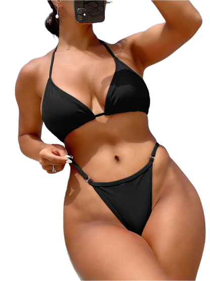  Bikini with Rhinestone Chain: view of a bikini with a black strap top and a rhinestone chain detail on the bottom, adding a touch of sparkle.

