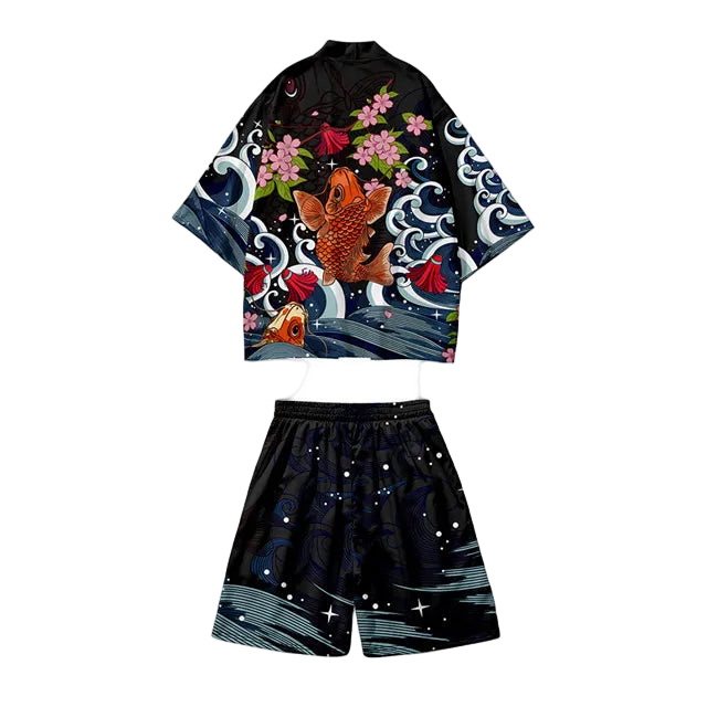 Set of black kimono-style top with fish and floral design and black shorts with star pattern on a white background.