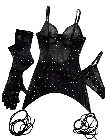 Black lingerie set with star patterns on a soft fabric background