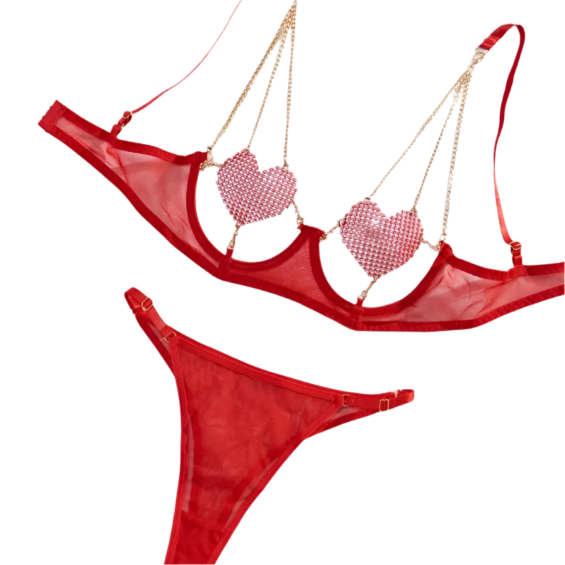 A red lingerie set with sparkling embellishments. The top features heart-shaped accents and is connected with gold chains, paired with a matching bottom.