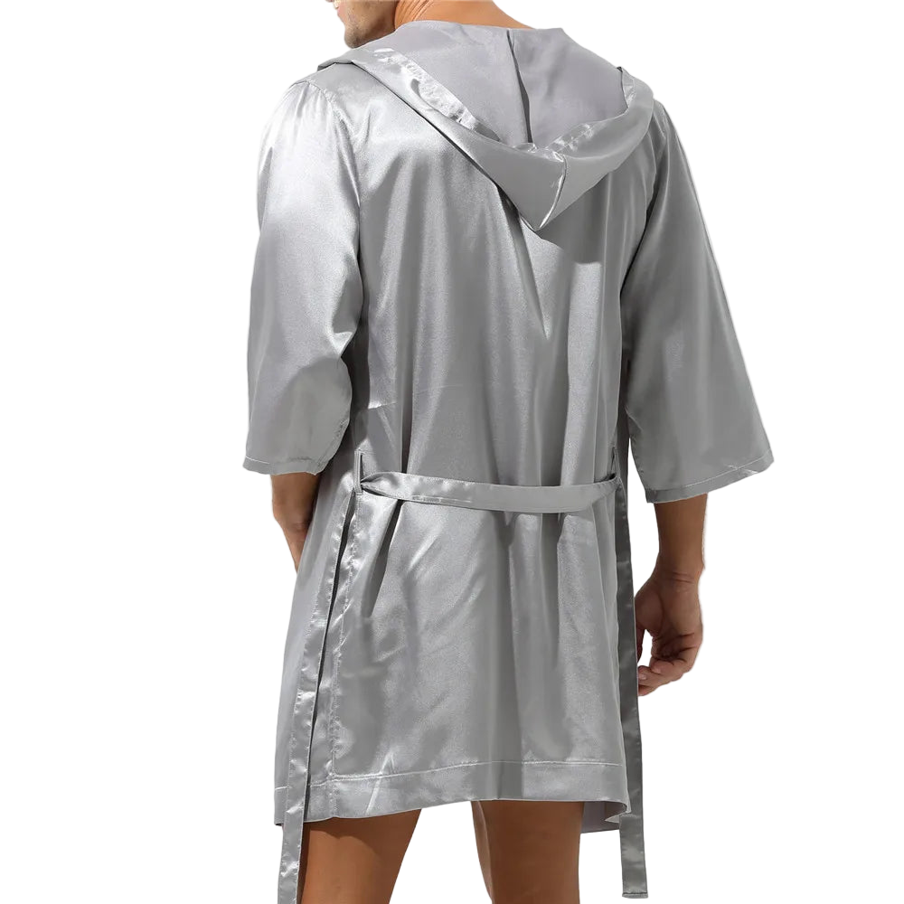 Silver raincoat with hood on a white background