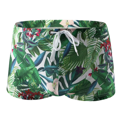 Floral-patterned boxer briefs with tropical leaf and flower design.