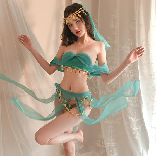 an exotic costume with a turquoise theme. It includes an off-the-shoulder bandeau top and a matching skirt adorned with flowing ribbons and gold coin embellishments. The ensemble is completed with a matching headpiece, creating a whimsical and enchanting look