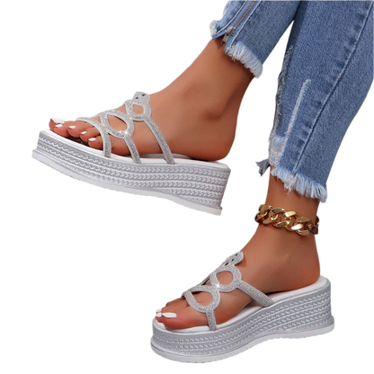 Glamorous crystal-embellished platform slides with 6cm wedge heel, perfect for resort pool parties

