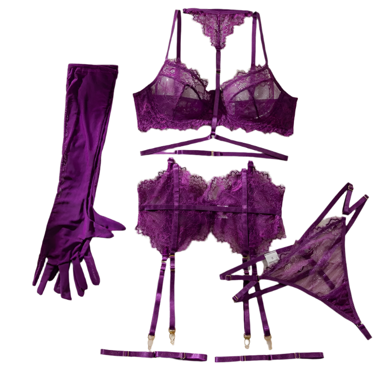 Purple lace lingerie set with gloves and flowers on a white surface