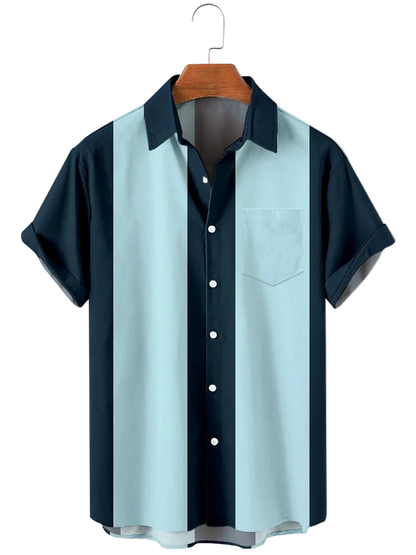 Short-sleeve shirt with a two-tone design on a hanger against a white background