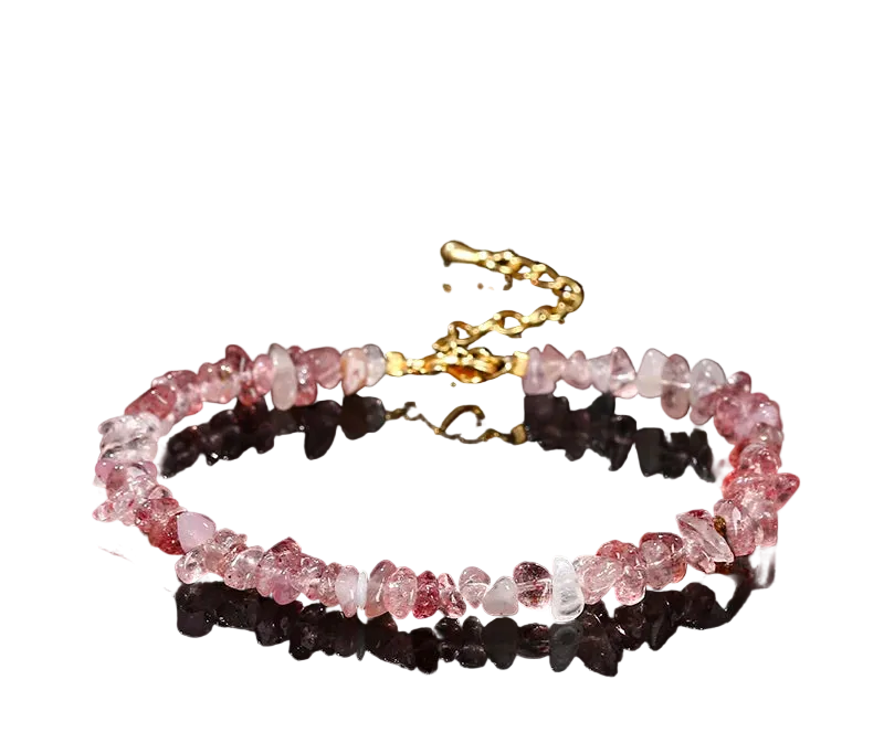Necklace made of natural strawberry quartz on a black background