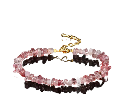 Necklace made of natural strawberry quartz on a black background
