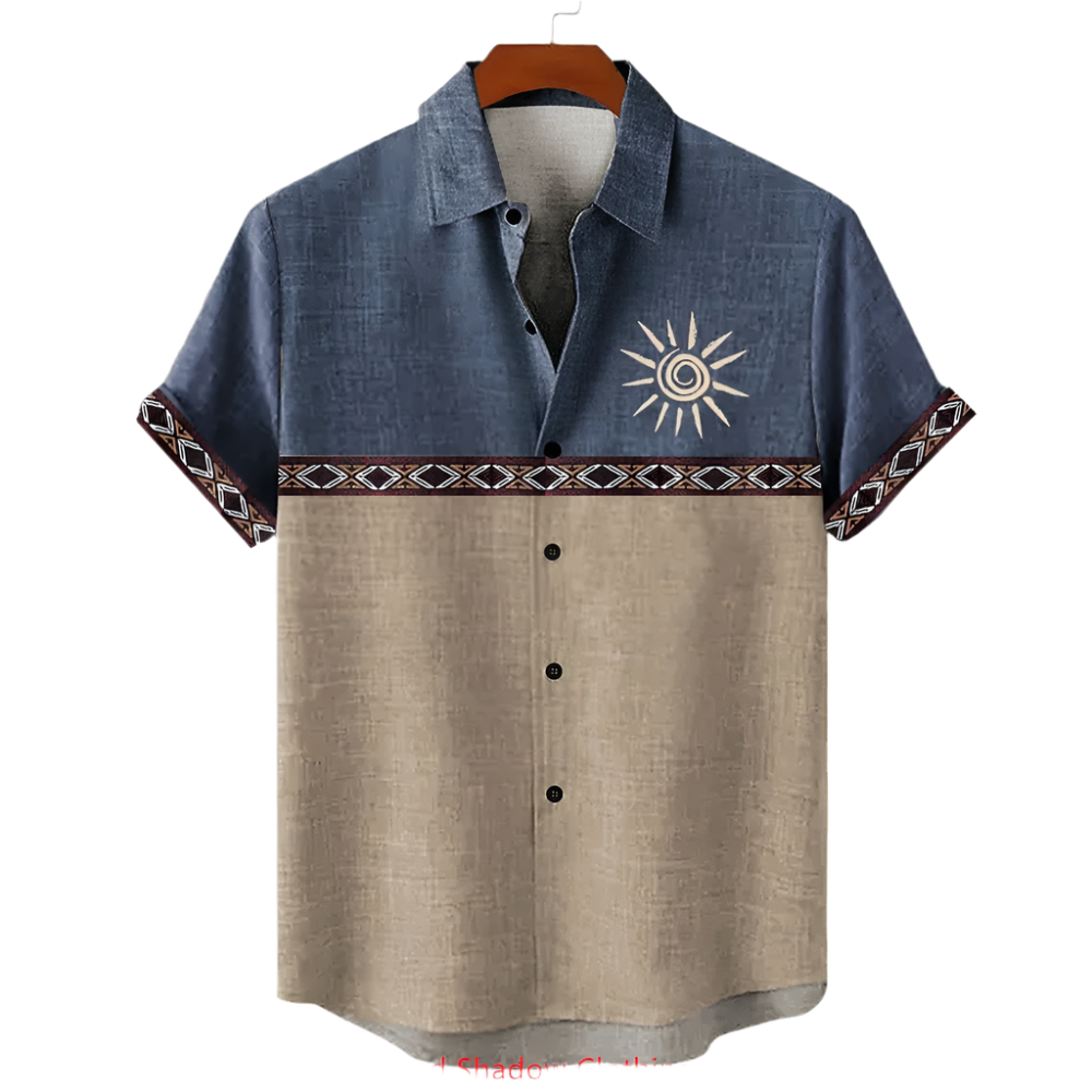 Two-tone shirt with sun design on a hanger against a white background