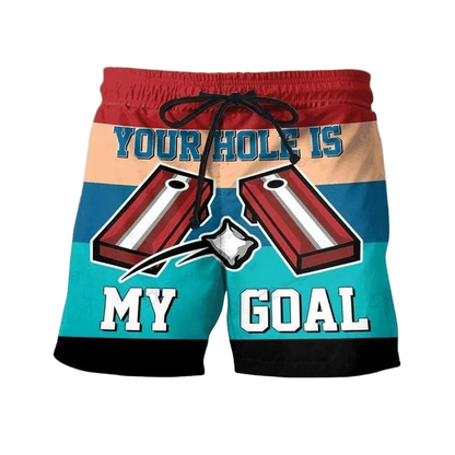 Beach shorts with a graphic design and text on a beach background