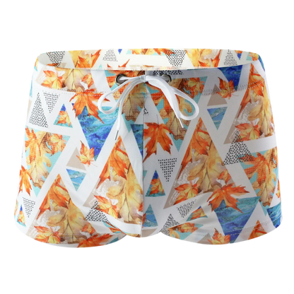 Floral-patterned boxer briefs with tropical leaf and flower design.