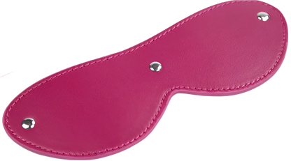 A pink leather eye mask and studded details. The design is sleek and mysterious, perfect for a costume or themed event.