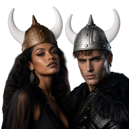 A man and a woman wearing Viking-style horned helmets, posed together against a dark smoky background. The woman wears a bronze helmet with white horns, and the man wears a silver helmet with white horns.
