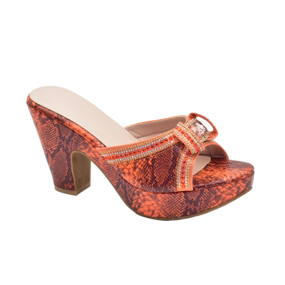 Orange snake print high heel shoe with embellishments on a white background