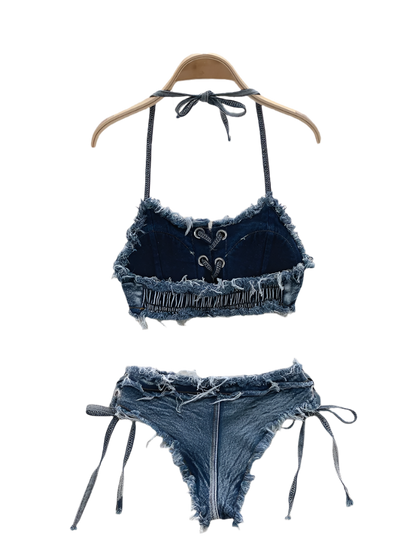 Denim bikini set on a hanger with decorative background