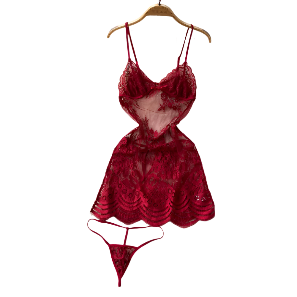 Red lace lingerie set on a white fur rug with flowers and a hat in the background