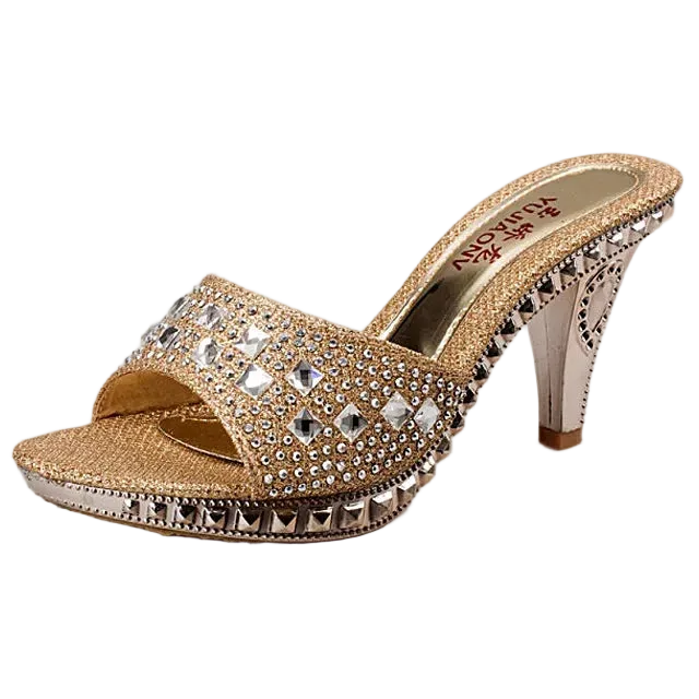 Gold high-heeled shoe with rhinestone embellishments on a white background