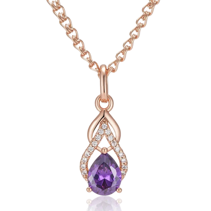 Rose gold necklace with a purple teardrop pendant on a white background
