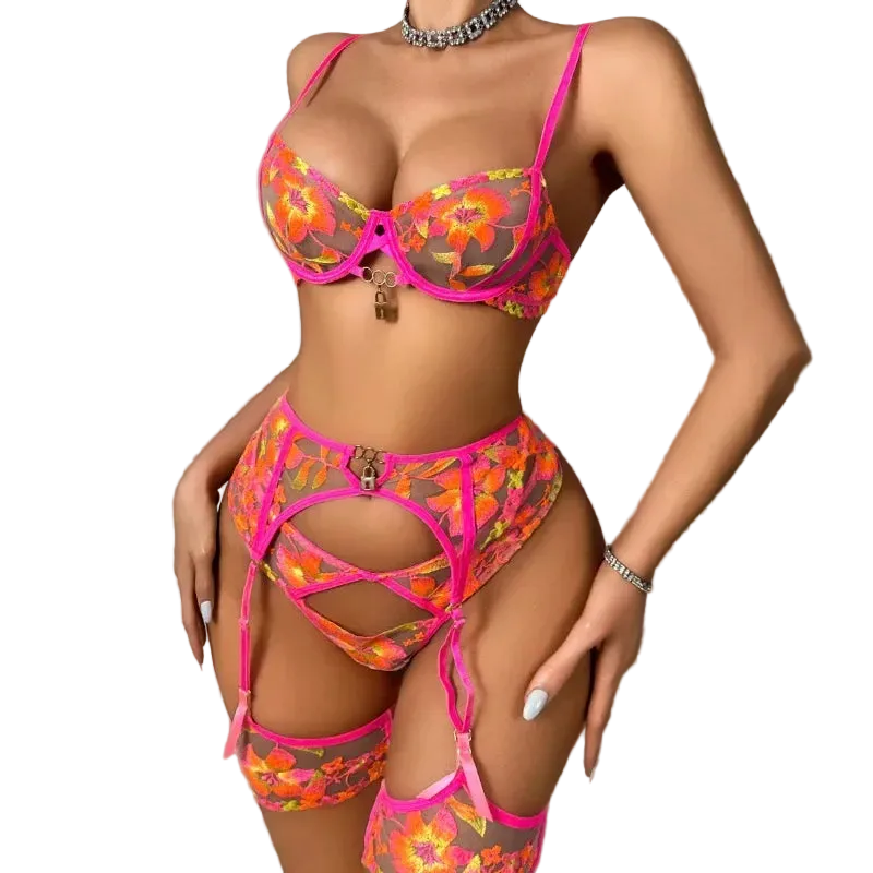 Floral lingerie set with pink straps on a neutral background
