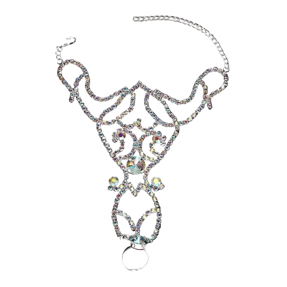 A silver-toned rhinestone belly chain with an intricate filigree design, a large central iridescent crystal, and a hanging ring, displayed on a dark reflective background.