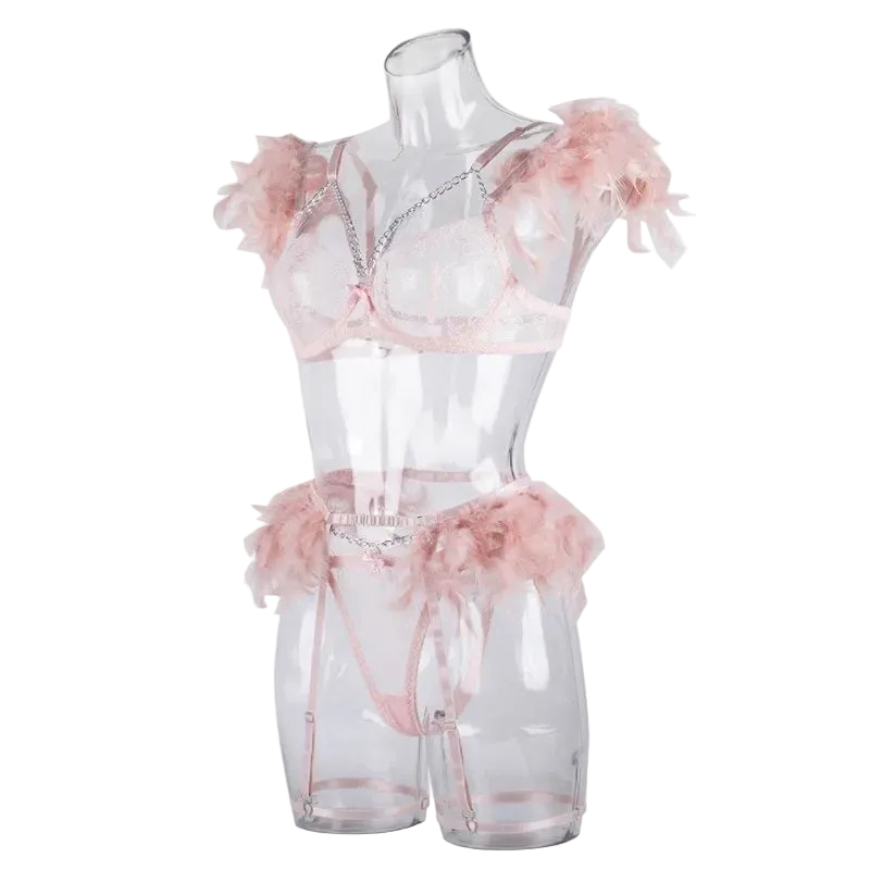 Translucent lingerie set with floral details on a mannequin against a white background