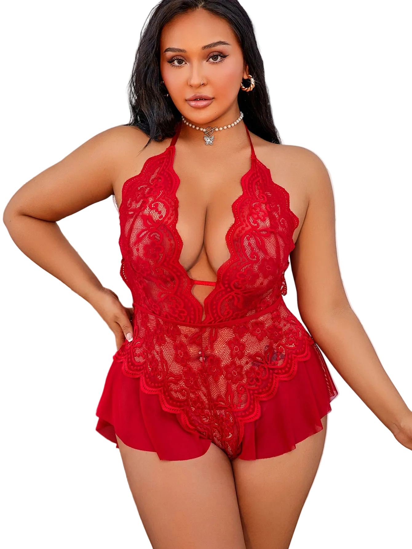 Woman wearing a red lace lingerie set in a well-lit room.