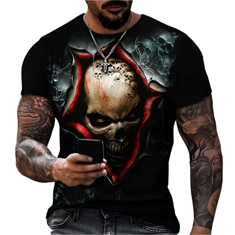 Man wearing a black t-shirt with a skull design, holding a phone.