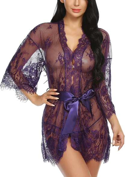 Purple lace lingerie set with a satin ribbon on a white background