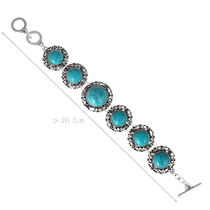 Bracelet with turquoise stones and silver accents on a white background