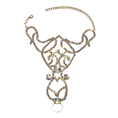Gold-tone filigree collar necklace embellished with iridescent rhinestones and a central clear crystal, displayed on a dark background.