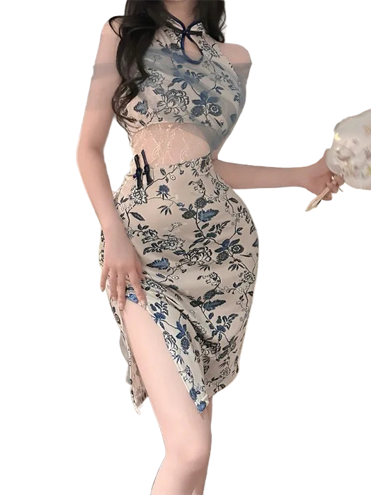 Woman wearing a floral dress in a bedroom setting