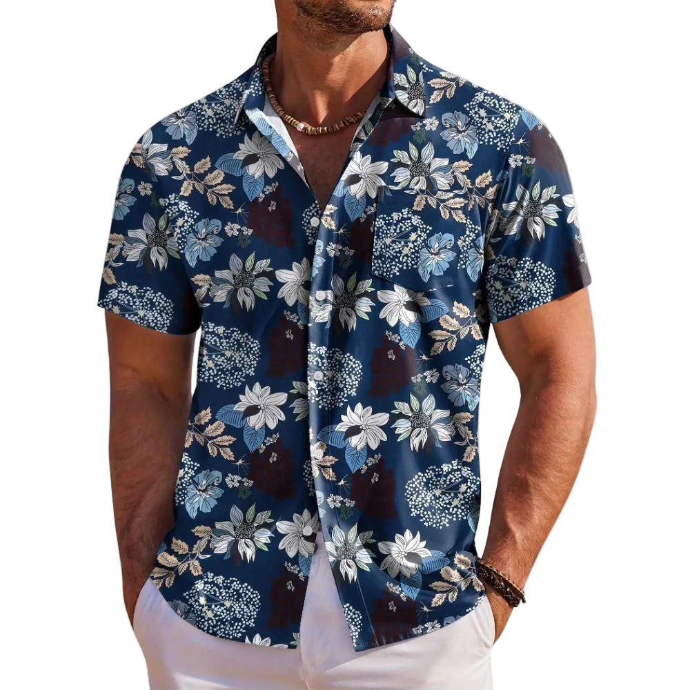 Man wearing a blue floral short-sleeve shirt on a white background