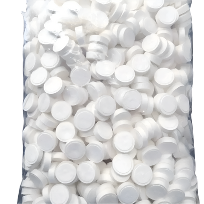 Compressed Towels: A collection of white compressed towels packaged in transparent tubes, ready for use when expanded with water