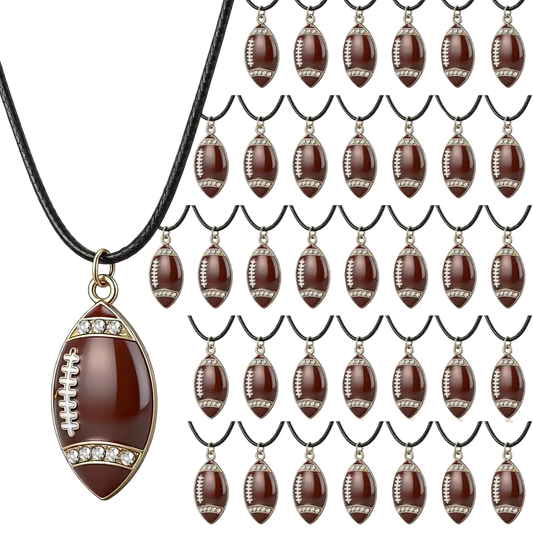 A football-shaped pendant necklace with a glossy dark brown body, gold-tone trim, white lacing detail, and small clear rhinestones, shown on a black cord. The main pendant is large and detailed, while the background contains many smaller repeated views of the same pendant on black cords.