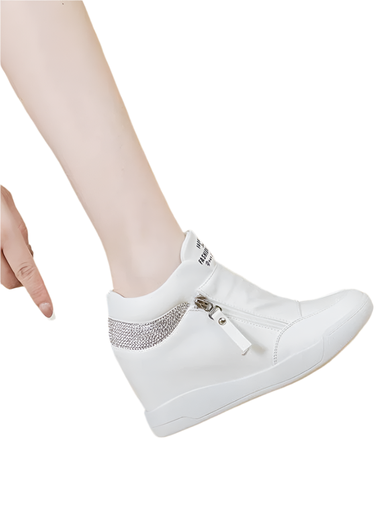 White sneaker with a decorative element on a beige background