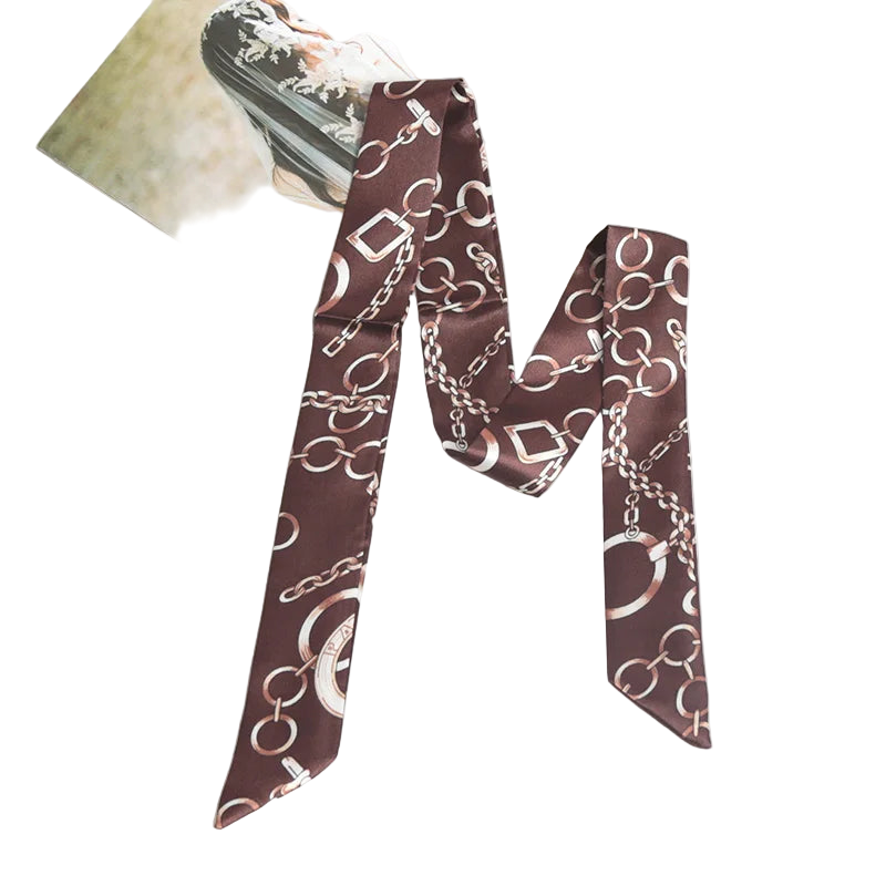 Brown scarf with chain pattern on a white surface