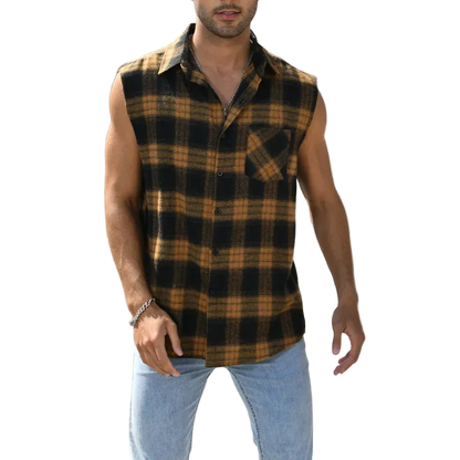 Man wearing a sleeveless plaid shirt in an outdoor setting