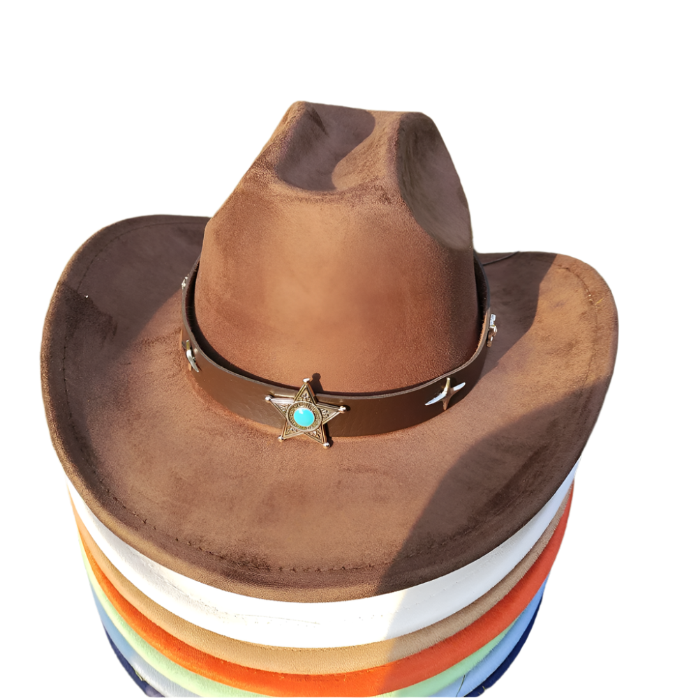 Brown cowboy hat with a star emblem on a stack of colorful hats against a grassy background