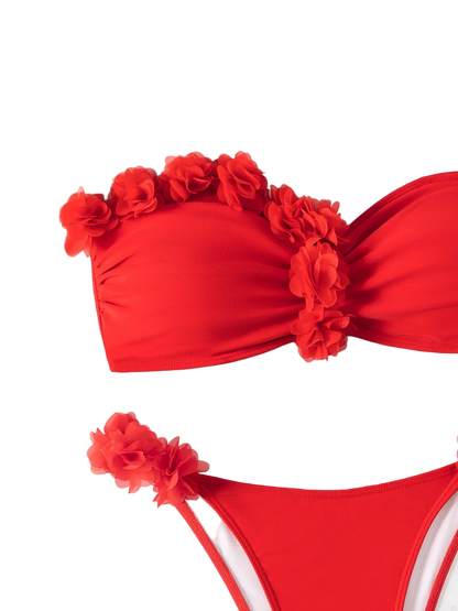 Red bikini with floral details on a white background