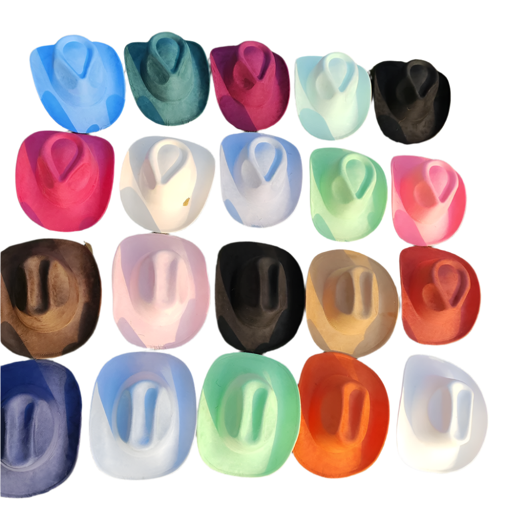 Colorful cowboy hats arranged in a grid on grass