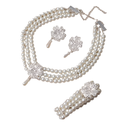 Complete vintage accessory set featuring pearl necklace, earrings, gloves and cigarette holder for Gatsby and Hollywood theme nights

