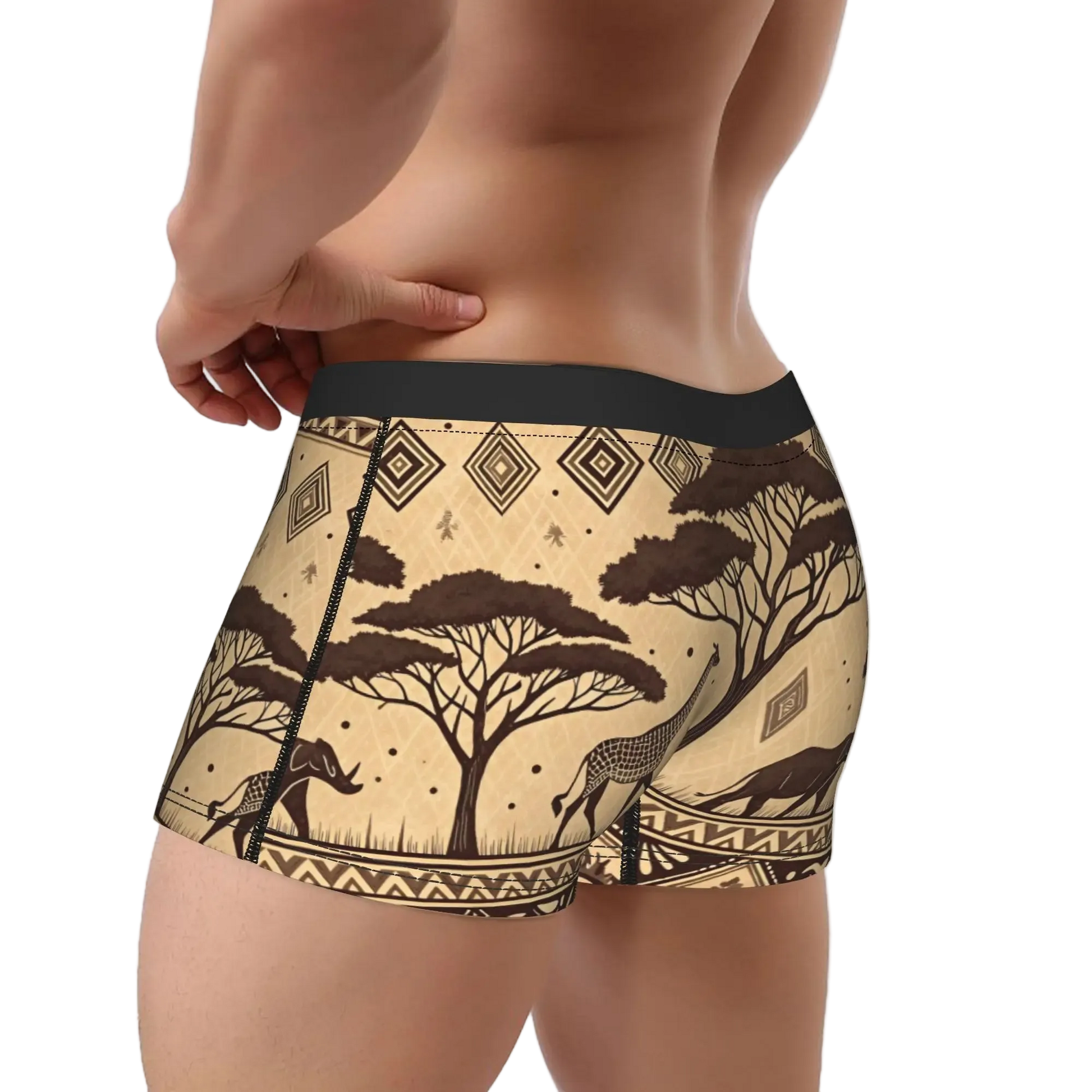 A close-up of a male model's lower torso wearing boxer briefs with a beige and brown African safari print featuring acacia trees, antelope, and geometric patterns, set against a plain white background.