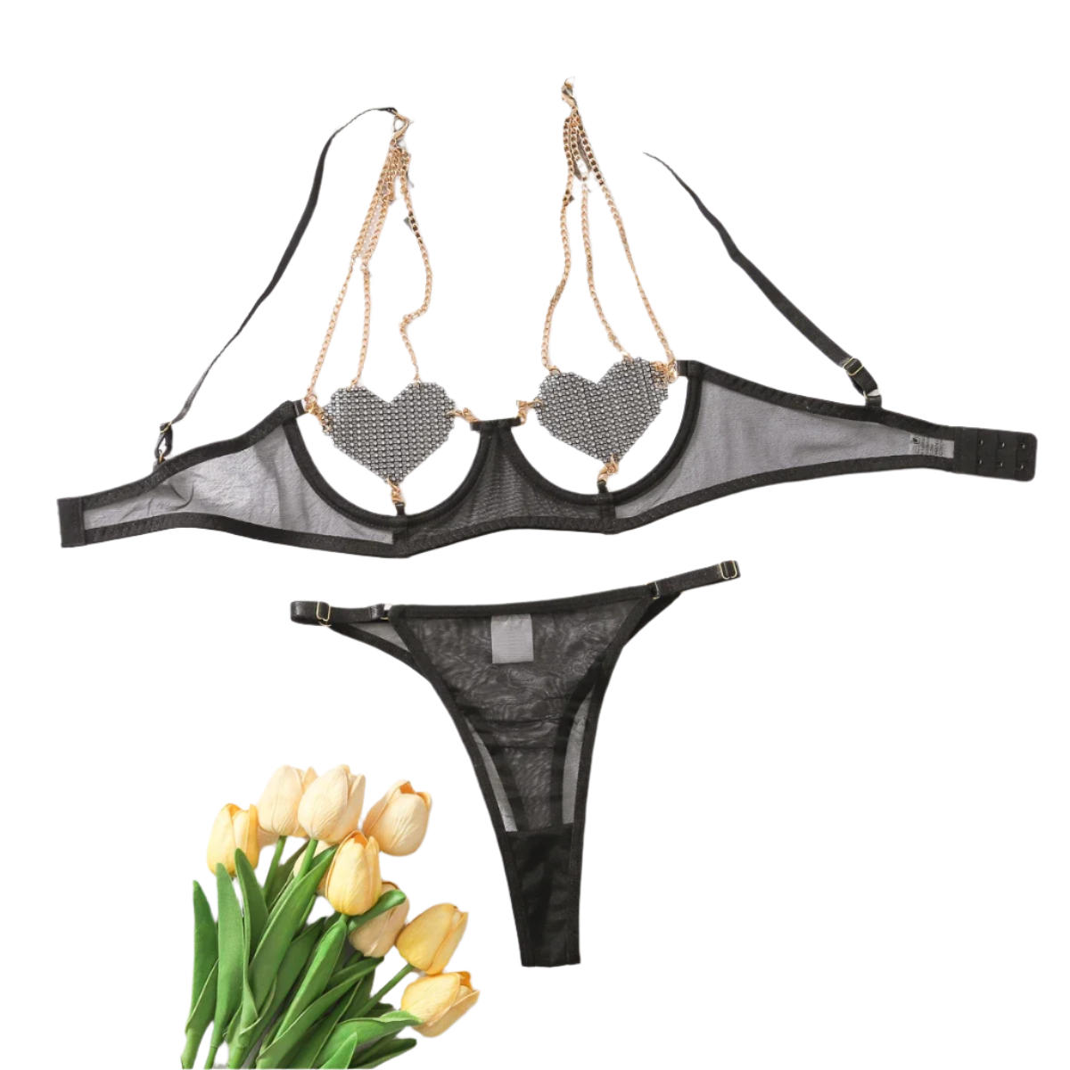 A  lingerie set with sparkling embellishments. The top features heart-shaped accents and is connected with gold chains, paired with a matching bottom.