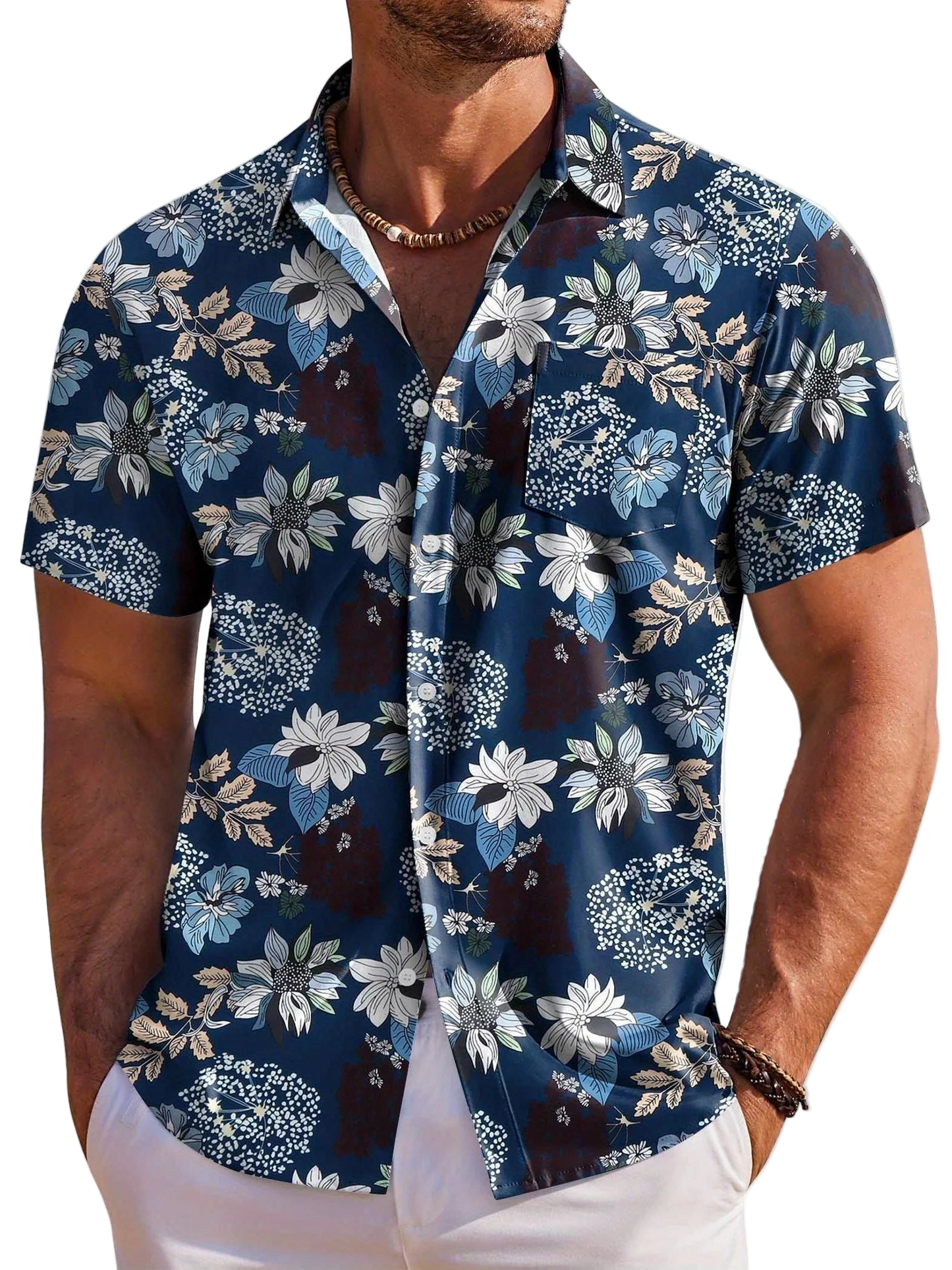 Man wearing a blue floral short-sleeve shirt on a white background